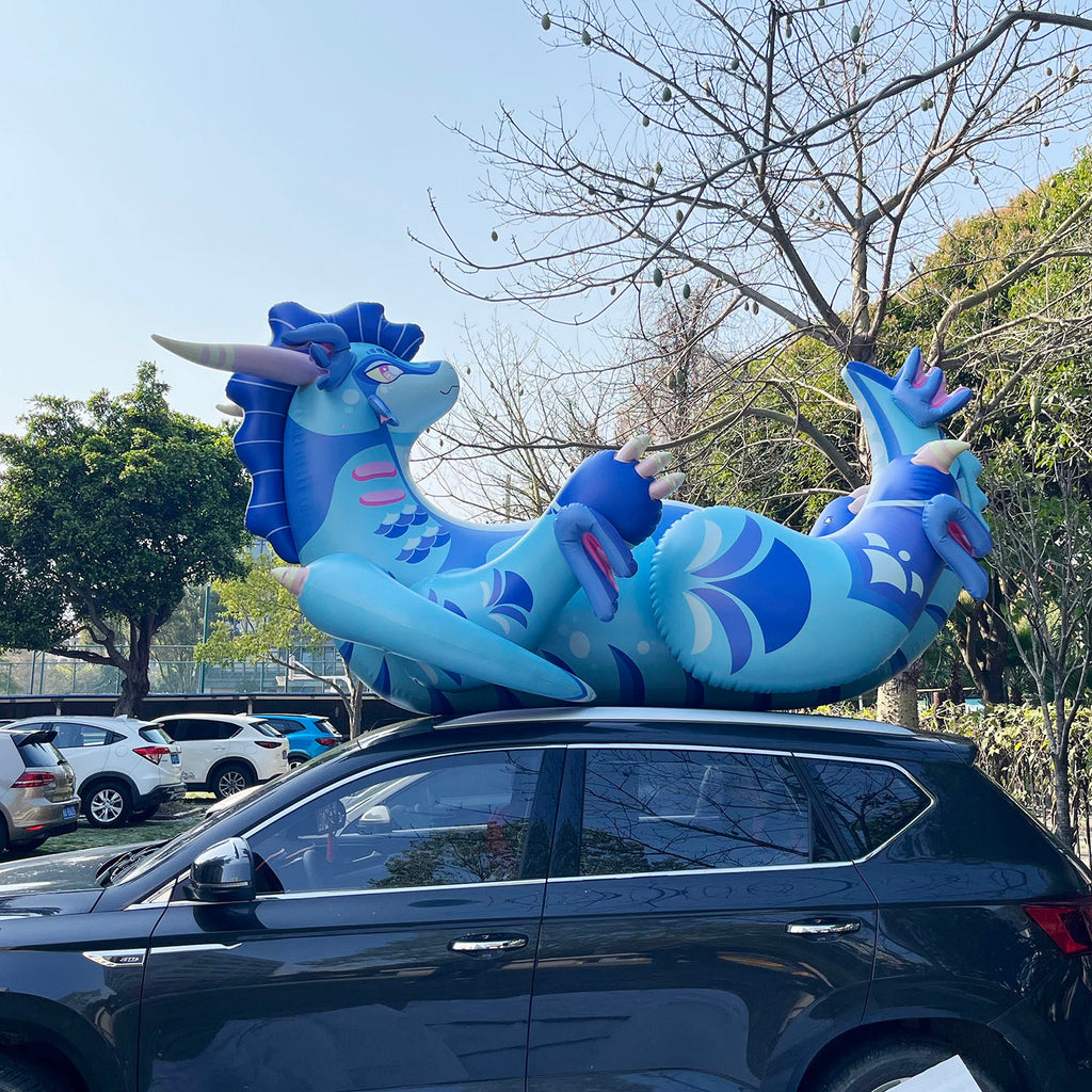 Blue dragon lounging shaped inflatable