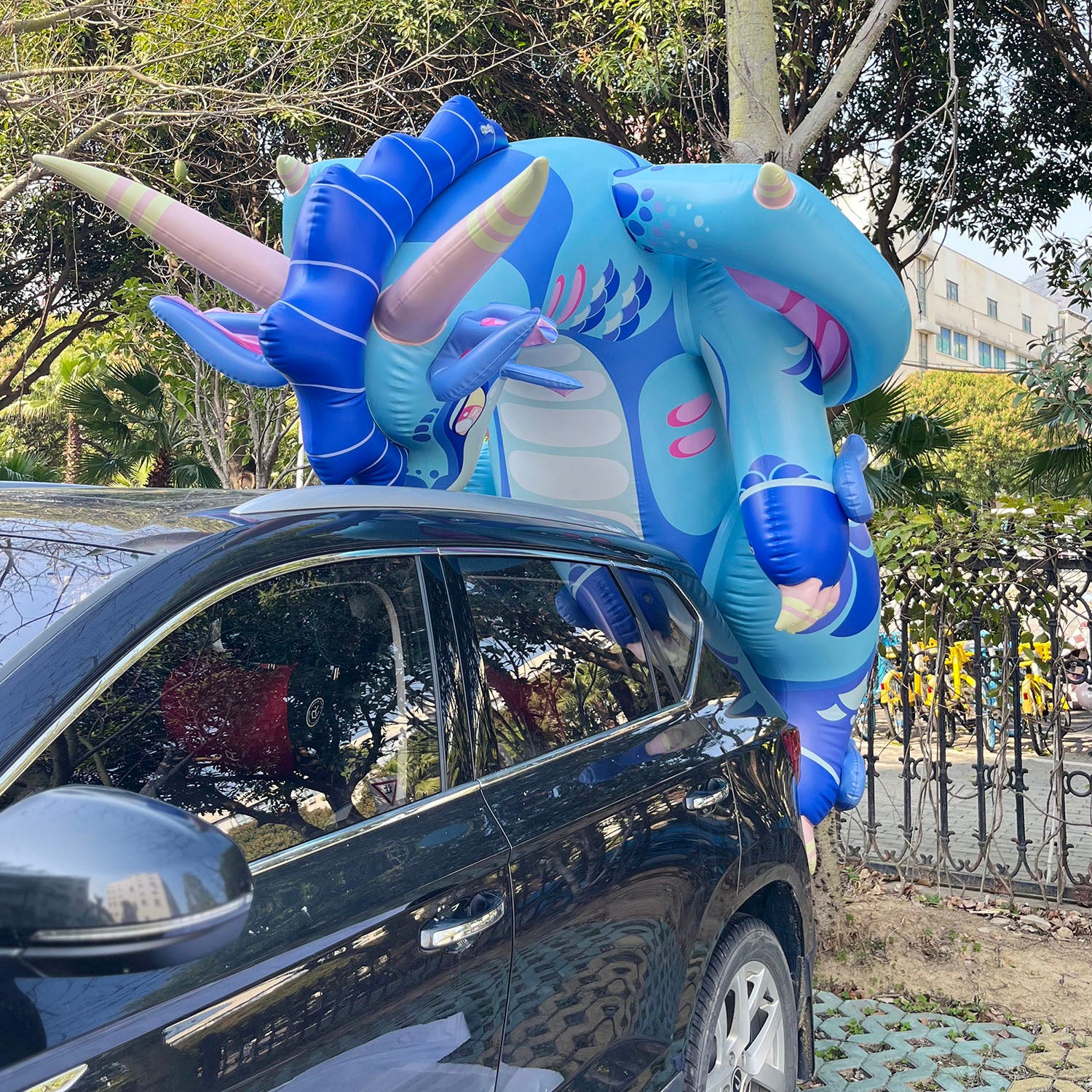 Blue dragon lounging shaped inflatable